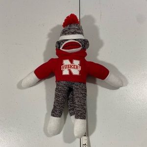 Plushland 2015 Nebraska Cornhuskers 11” sock monkey plush stuffed animal.